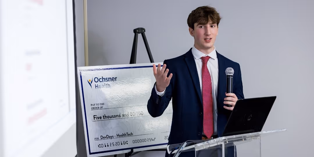 LSU mechanical engineering student William Coles demos his solution during the DevDays Healthcare Challenge, sponsored by Ochsner.