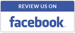 Button with text 'Review Us On' above the Facebook logo.