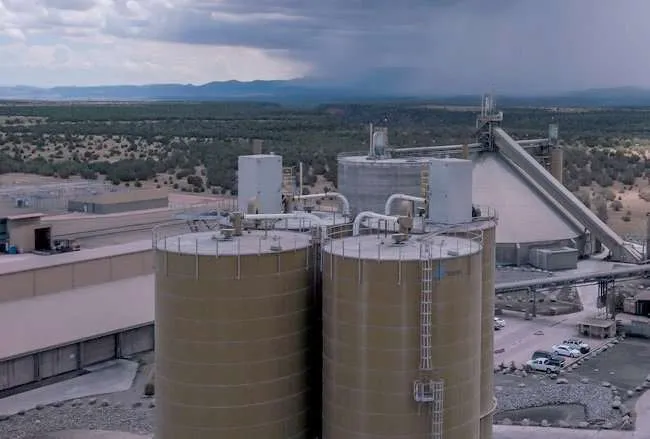 Petrochemical refinery skyline producing raw polymer feedstock