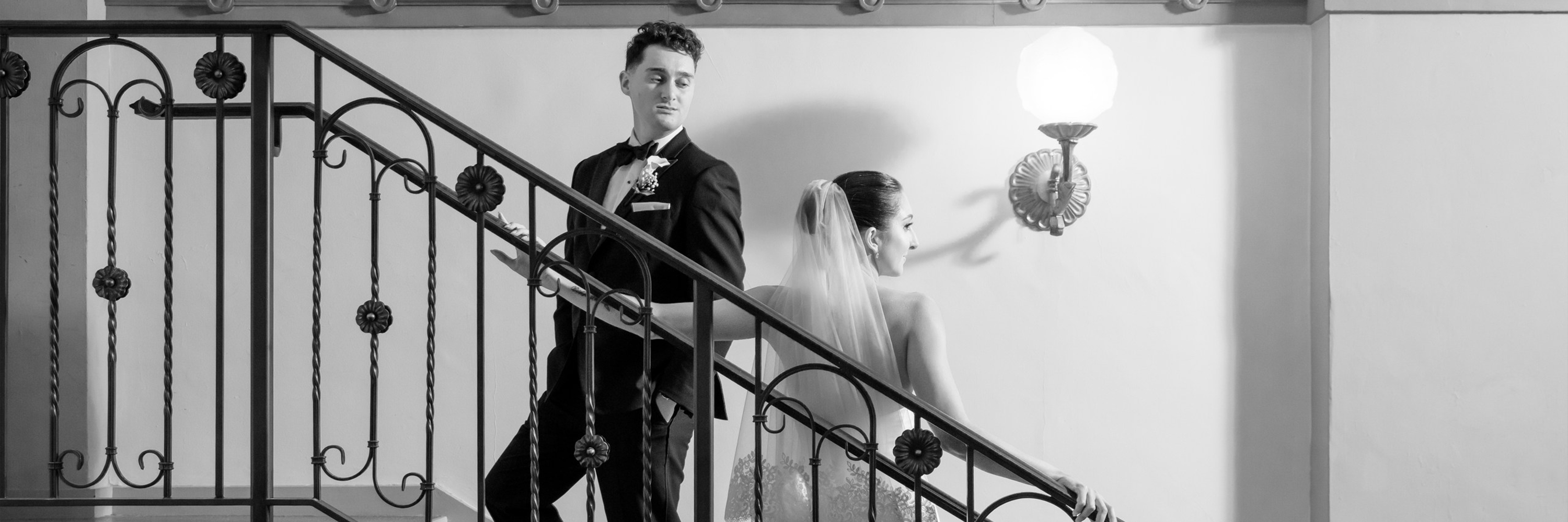 Smartphone resting on a gray couch cushion with sunlight casting shadows on the fabric.