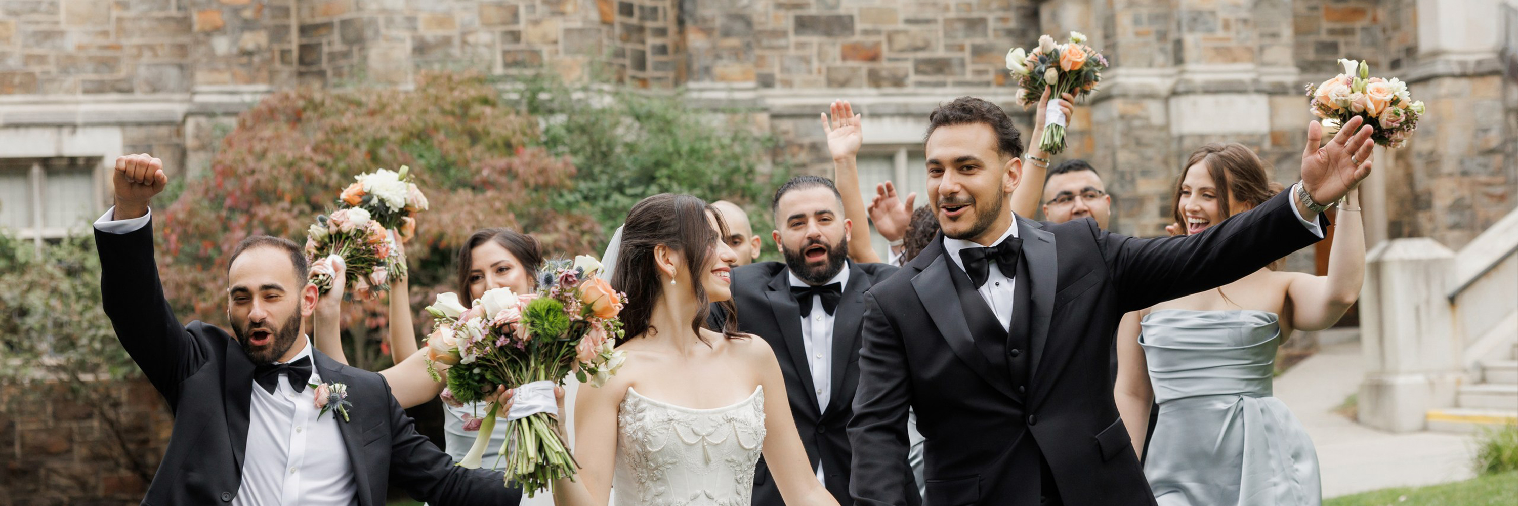Close-up of a person wearing orange-tinted goggles and a helmet with motion blur effect on an orange background.