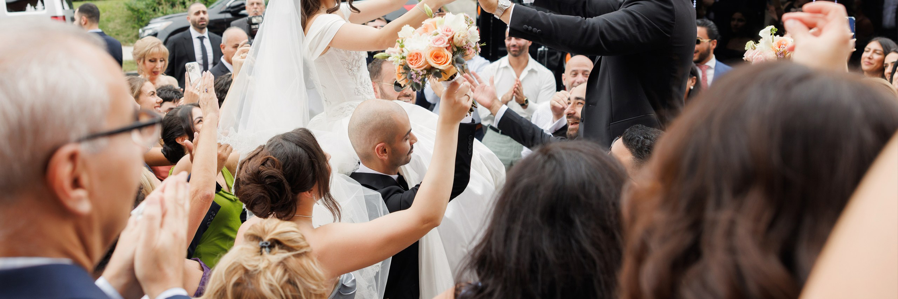 Silhouette of a person wearing glasses against a bright pink background, profile view.