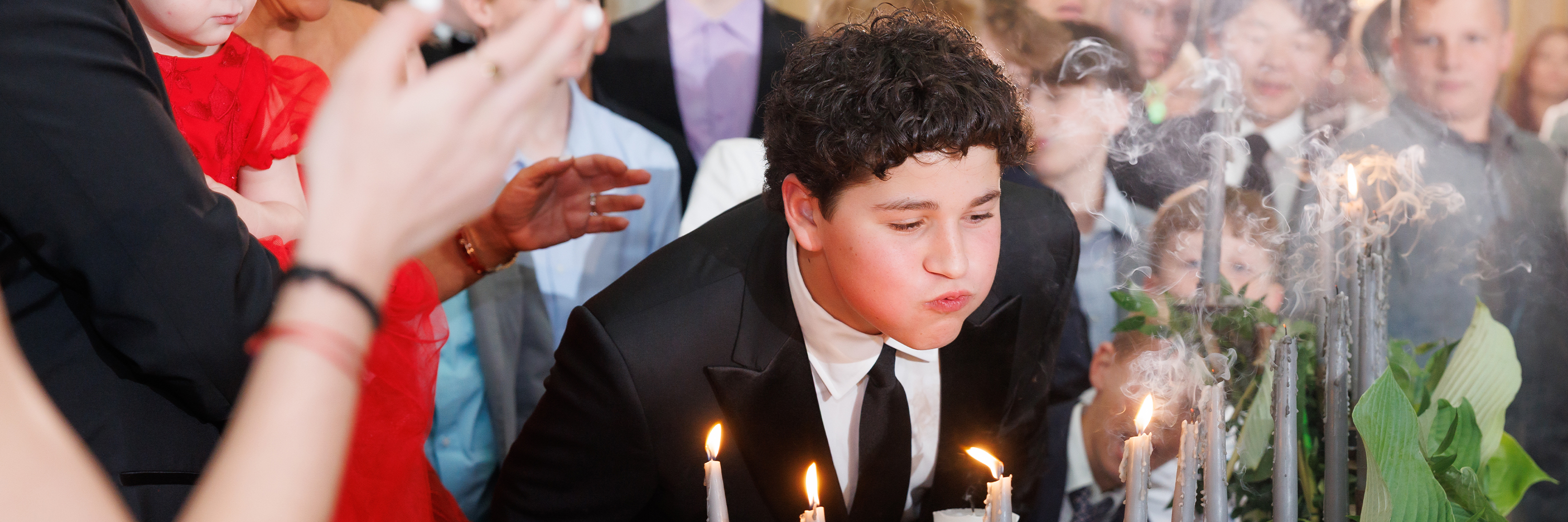 Stack of newspapers floating on clear, rippling water.