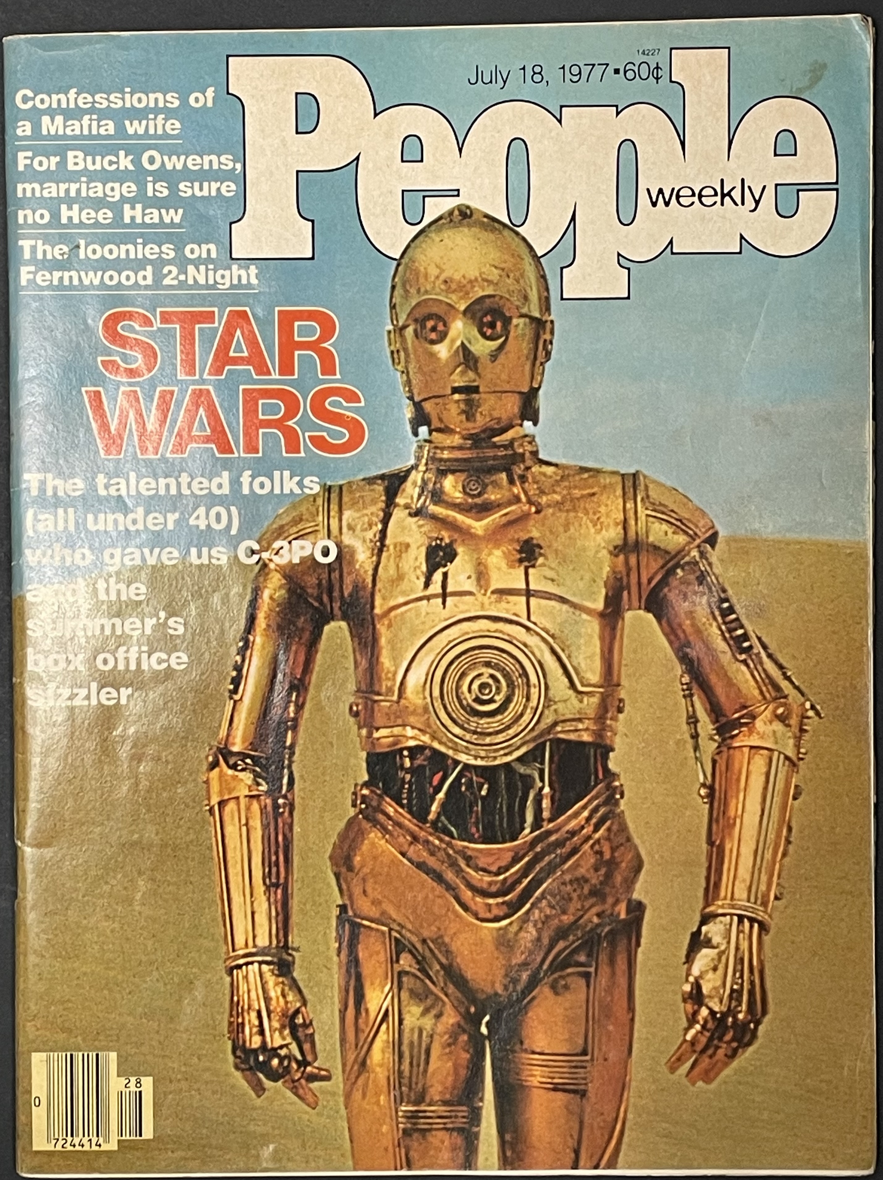 Costume sketch of a clown-like figure with a round beige torso, orange-striped sleeves, oversized purple pants, yellow gloves, and large yellow shoes.