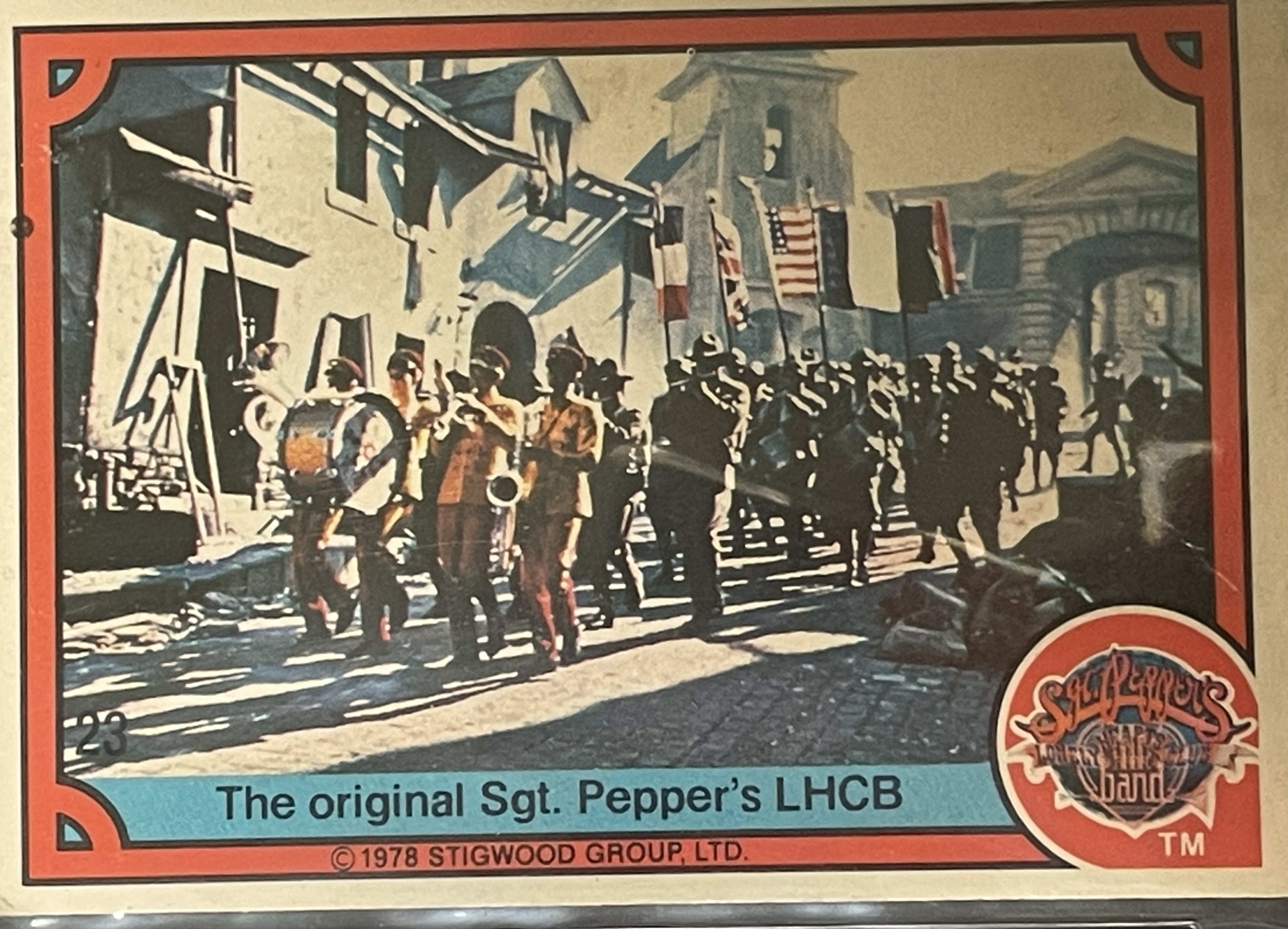 Costume sketch of a clown-like figure with a round beige torso, orange-striped sleeves, oversized purple pants, yellow gloves, and large yellow shoes.