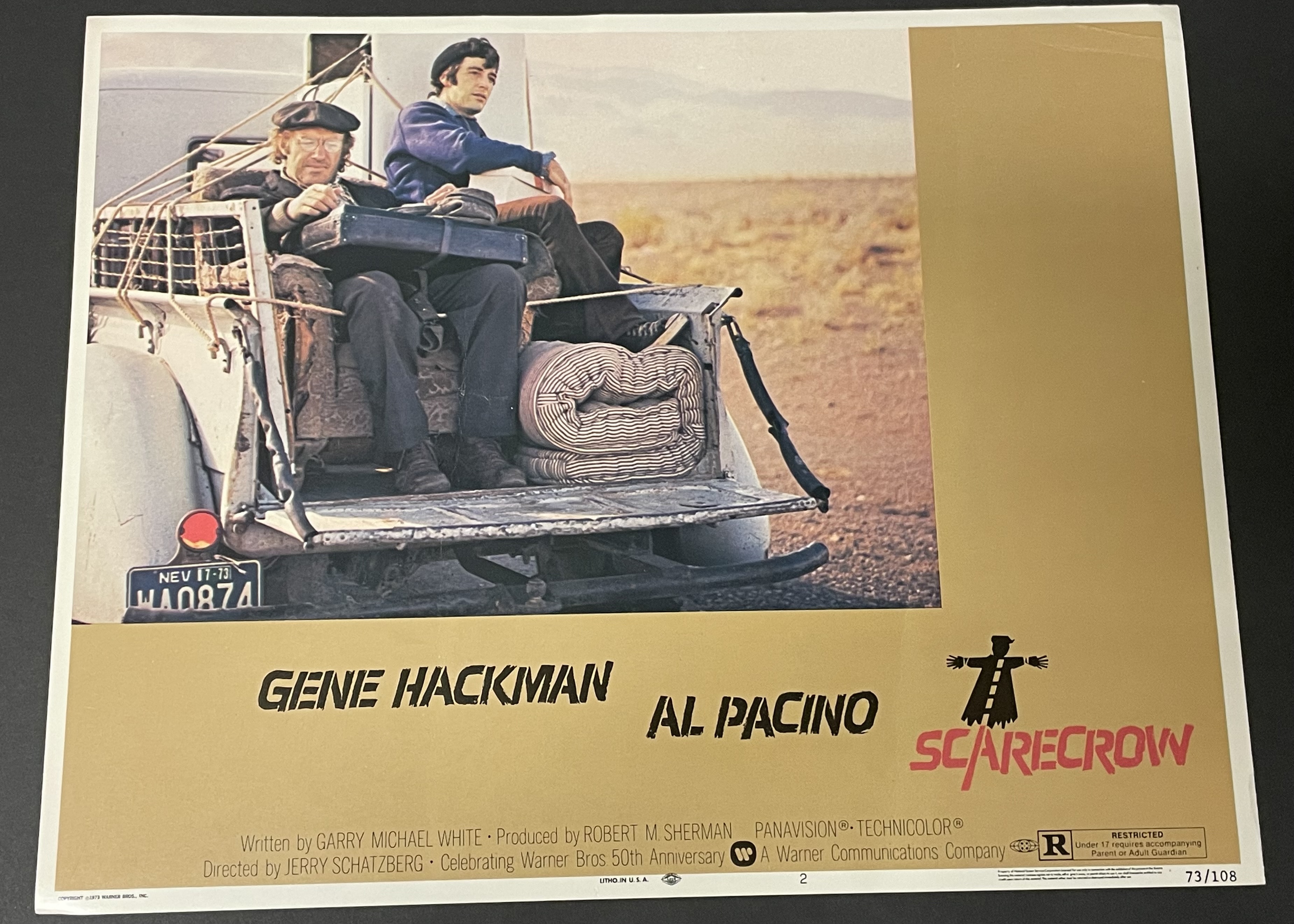 Costume sketch of a clown-like figure with a round beige torso, orange-striped sleeves, oversized purple pants, yellow gloves, and large yellow shoes.