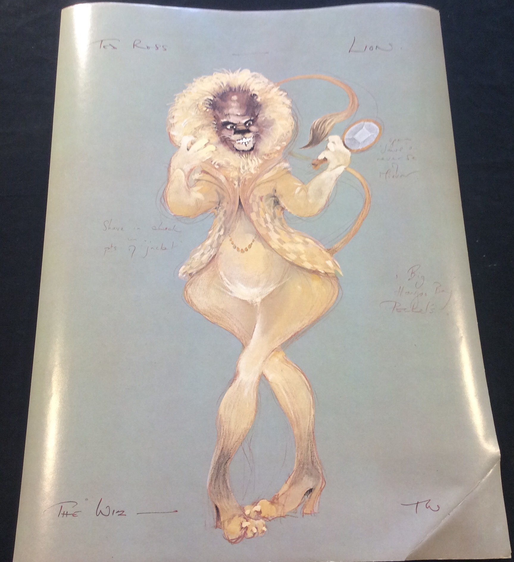 Costume sketch of a clown-like figure with a round beige torso, orange-striped sleeves, oversized purple pants, yellow gloves, and large yellow shoes.