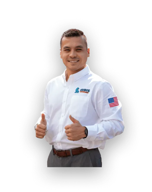 Smiling man wearing a white IRBIS shirt with an American flag patch gives two thumbs up.