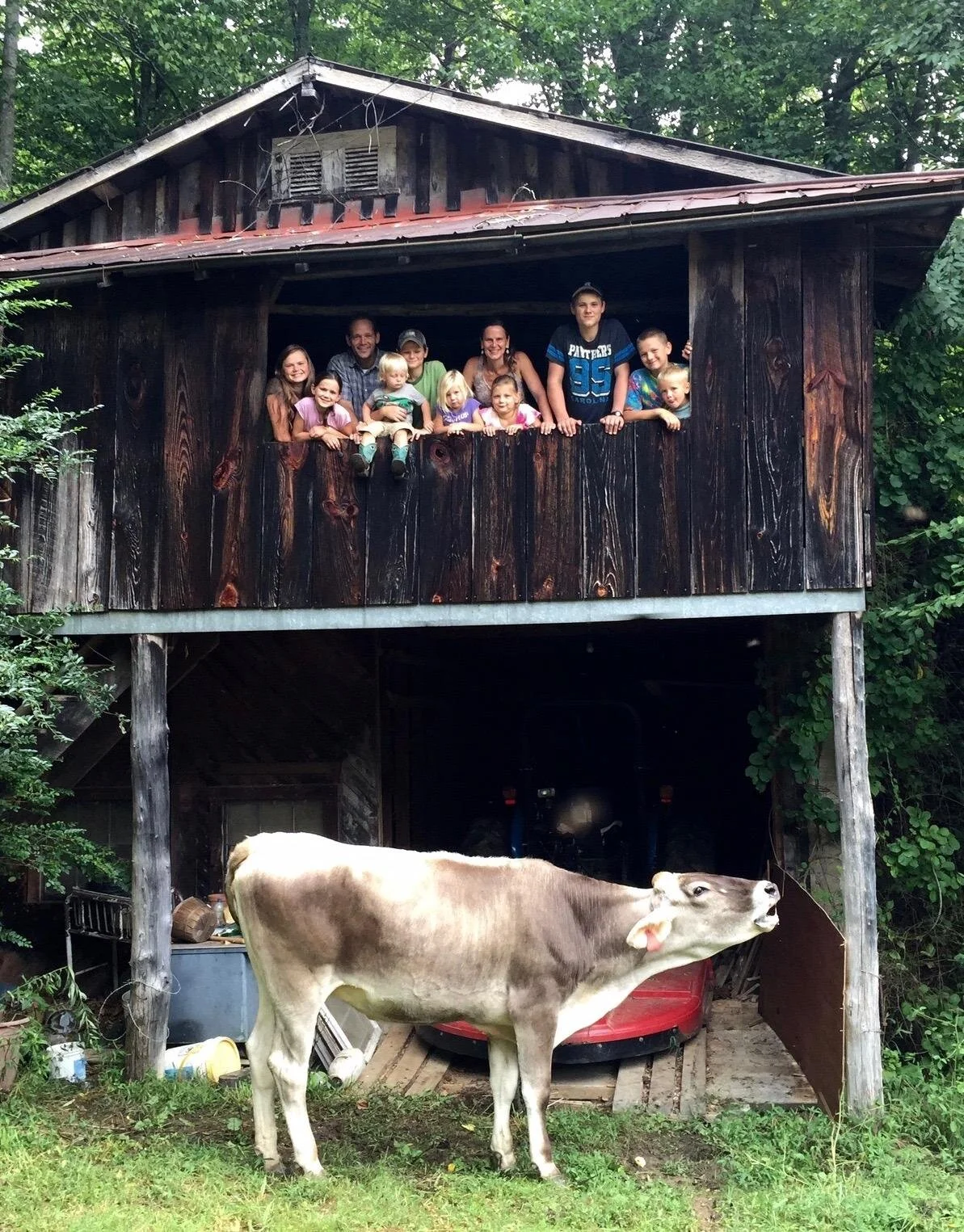 John and Denise Kapitan and family at their family farm.