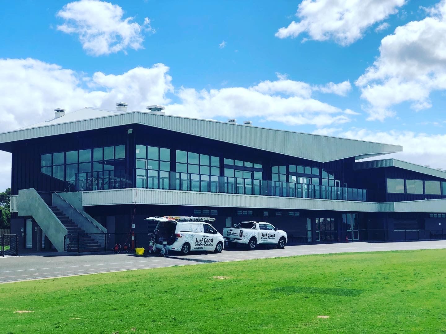 [background image] image of a nature scene visible through office windows (for a personal coach & consultant)