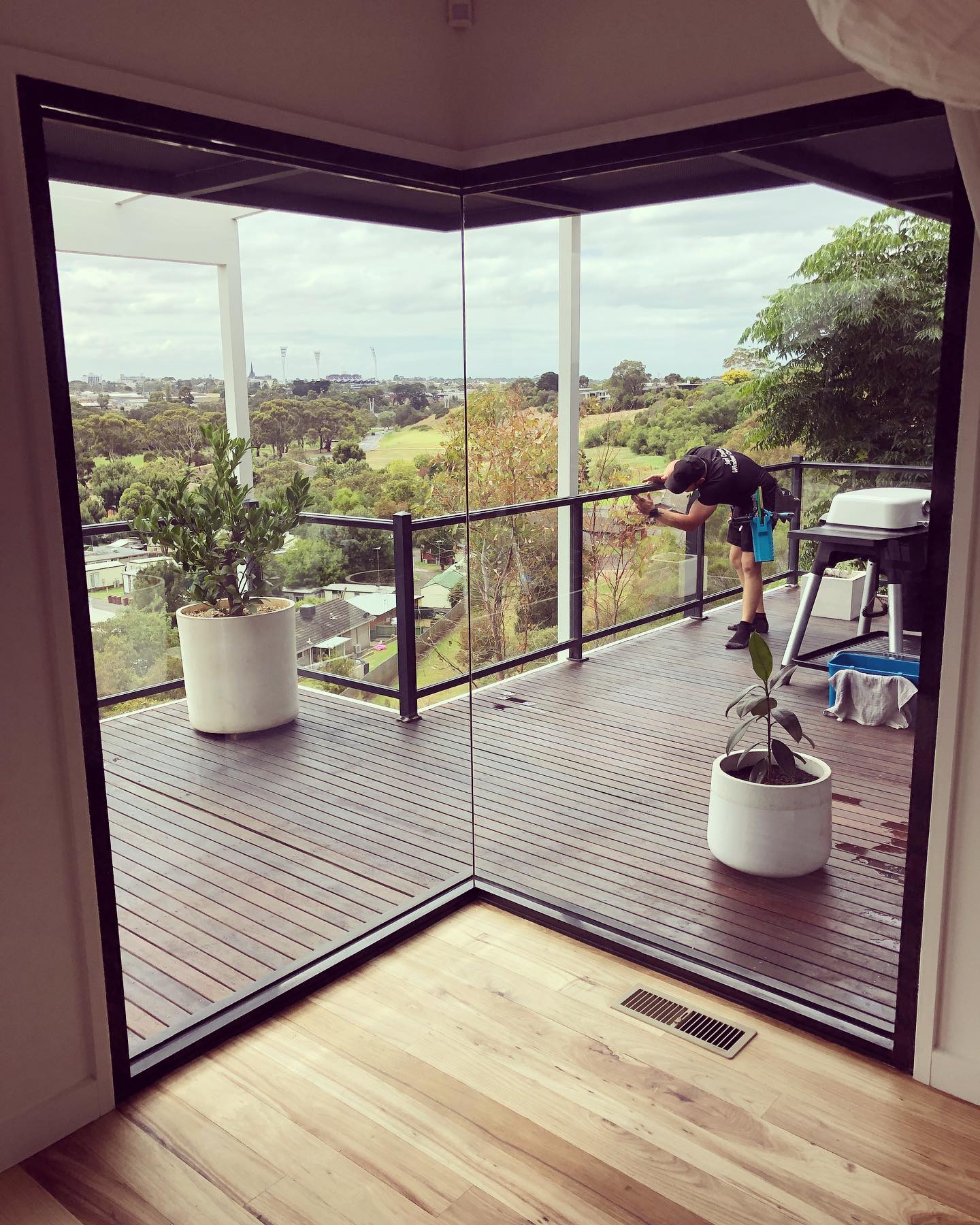 image of team in front of company building (for a roofing contractor)