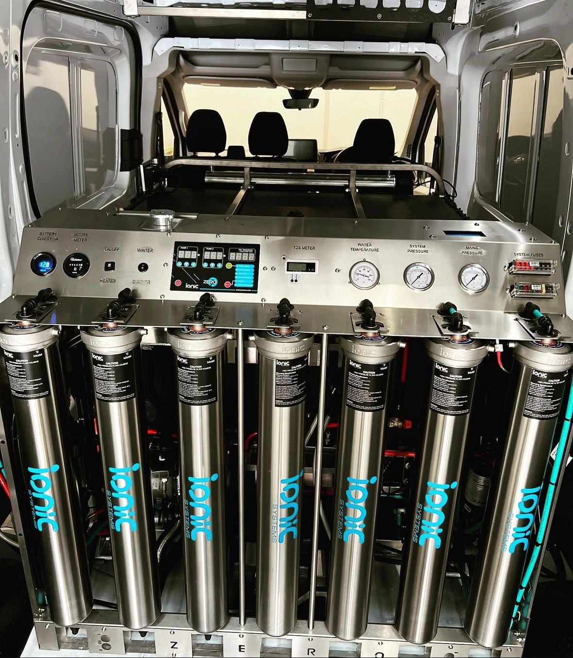 image of team in front of company building (for a roofing contractor)