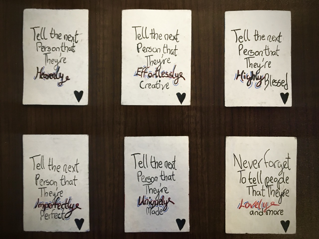 Six handwritten notes with uplifting messages about telling the next person they’re heavenly, effortlessly creative, highly blessed, imperfectly perfect, uniquely made, and lovely.