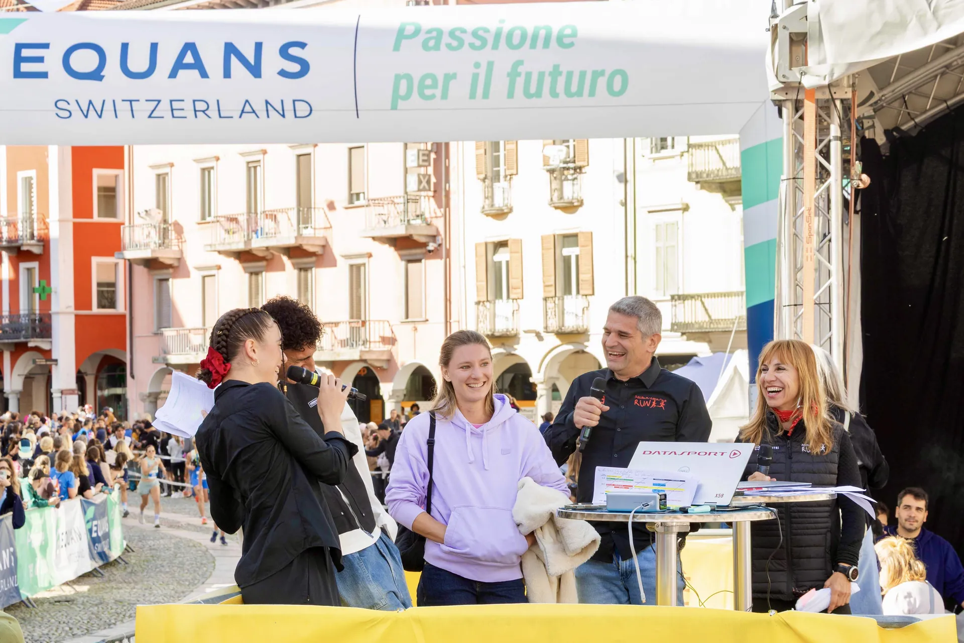 Ladina Ziani hosting a live interview at the Ascona-Locarno Run