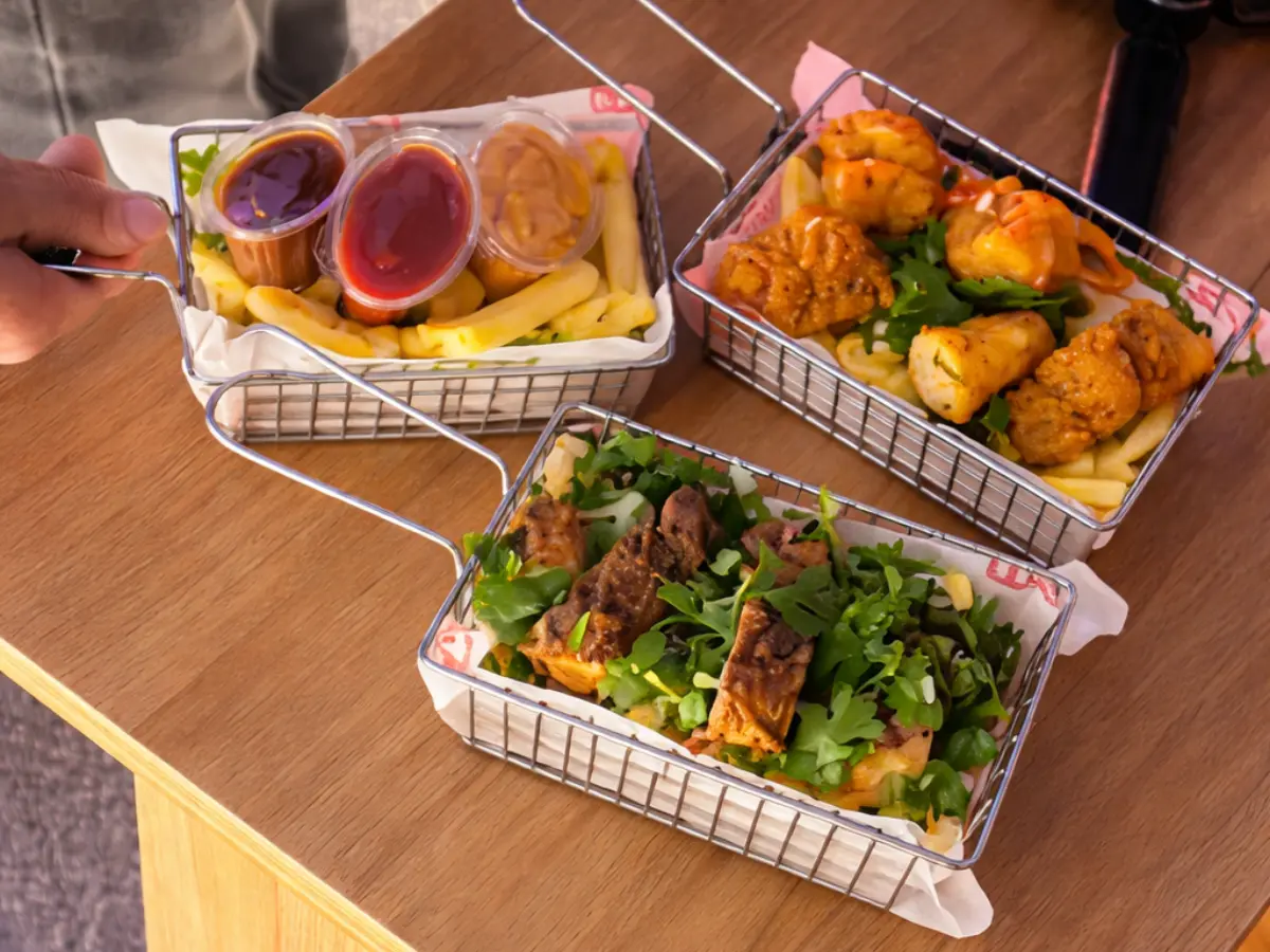 London chip shop style chips with fried chicken, fish and dipping sauces at CHIPZ London Cairo