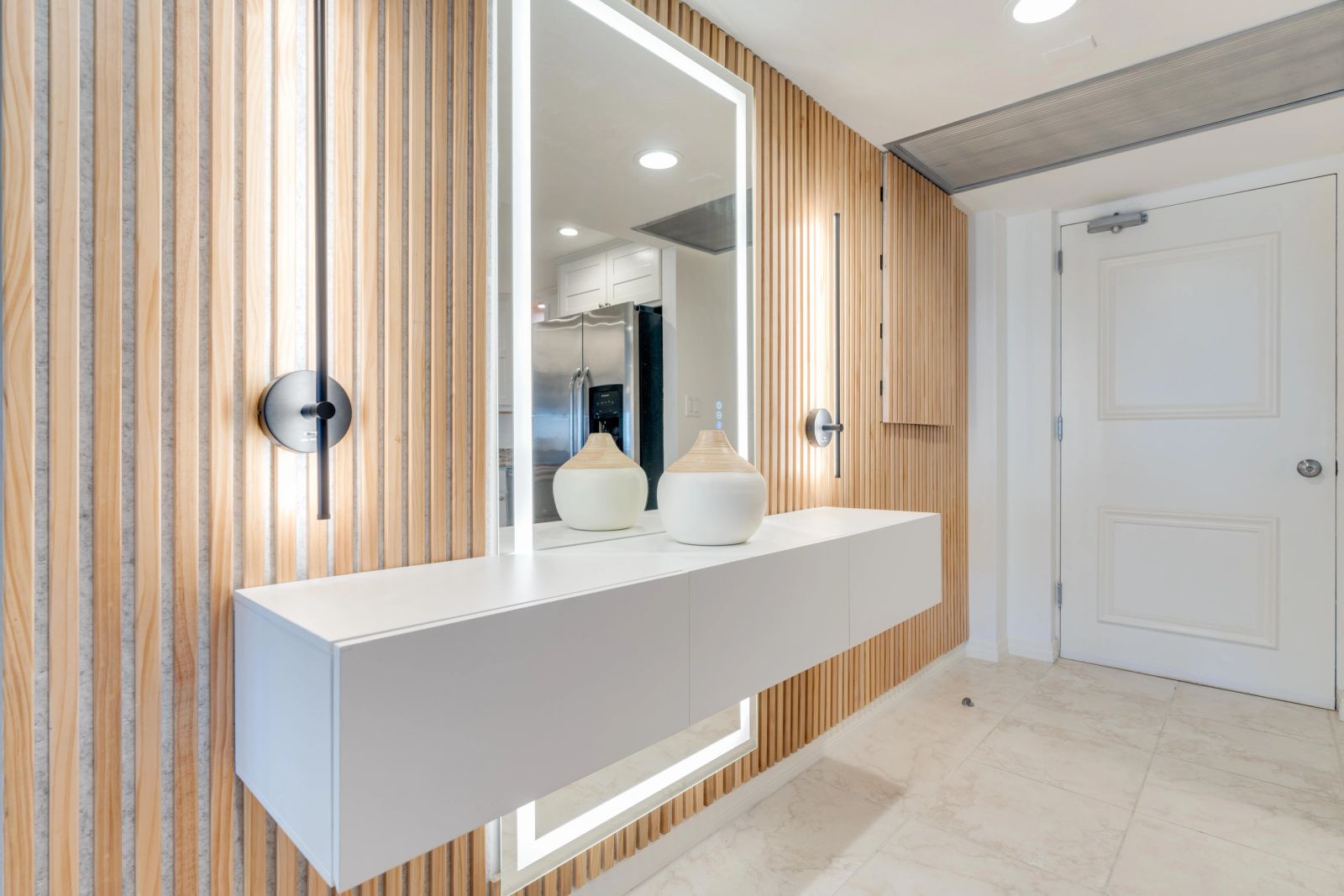 Bathroom mirror and floating vanity with timber detailing