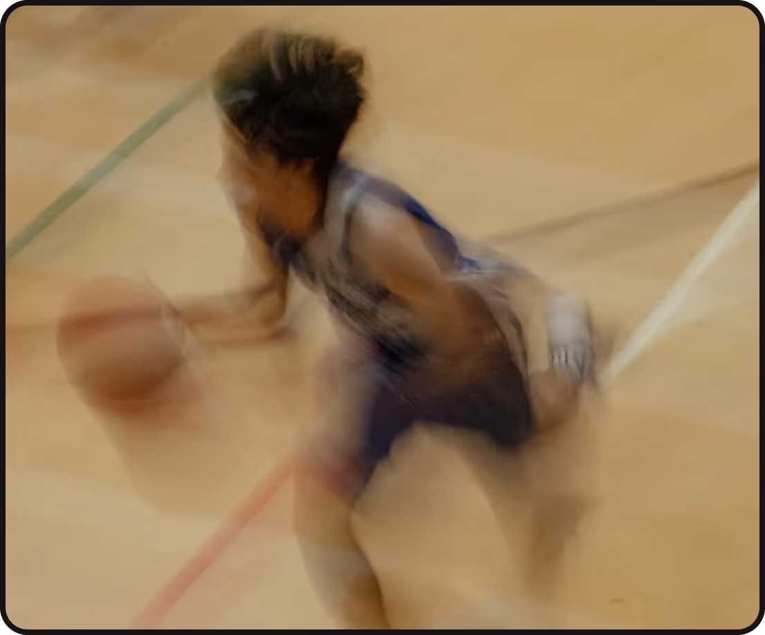blurry photo of kid playing basketball