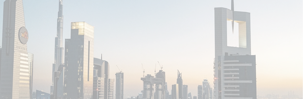 City skyline at sunset featuring modern skyscrapers and distinct architectural designs.