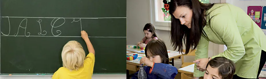 Young boy writing cursive letters on a blackboard and a teacher assisting children seated at desks with activities in a classroom.