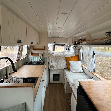 Conversion second round, a 22-seater bus made into an off-grid motorhome. Lived and worked from it full-time for a year.