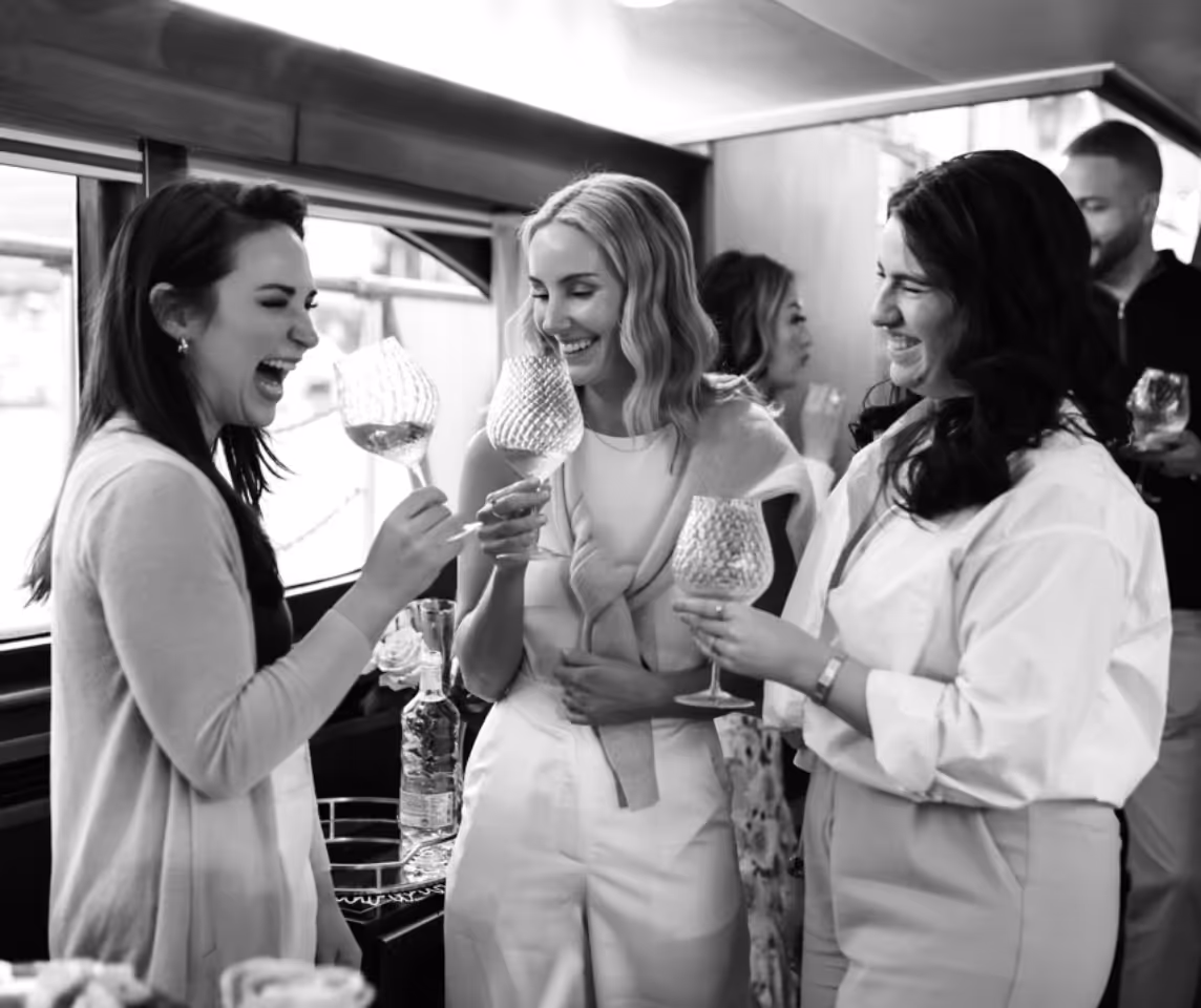 three girls are smiling