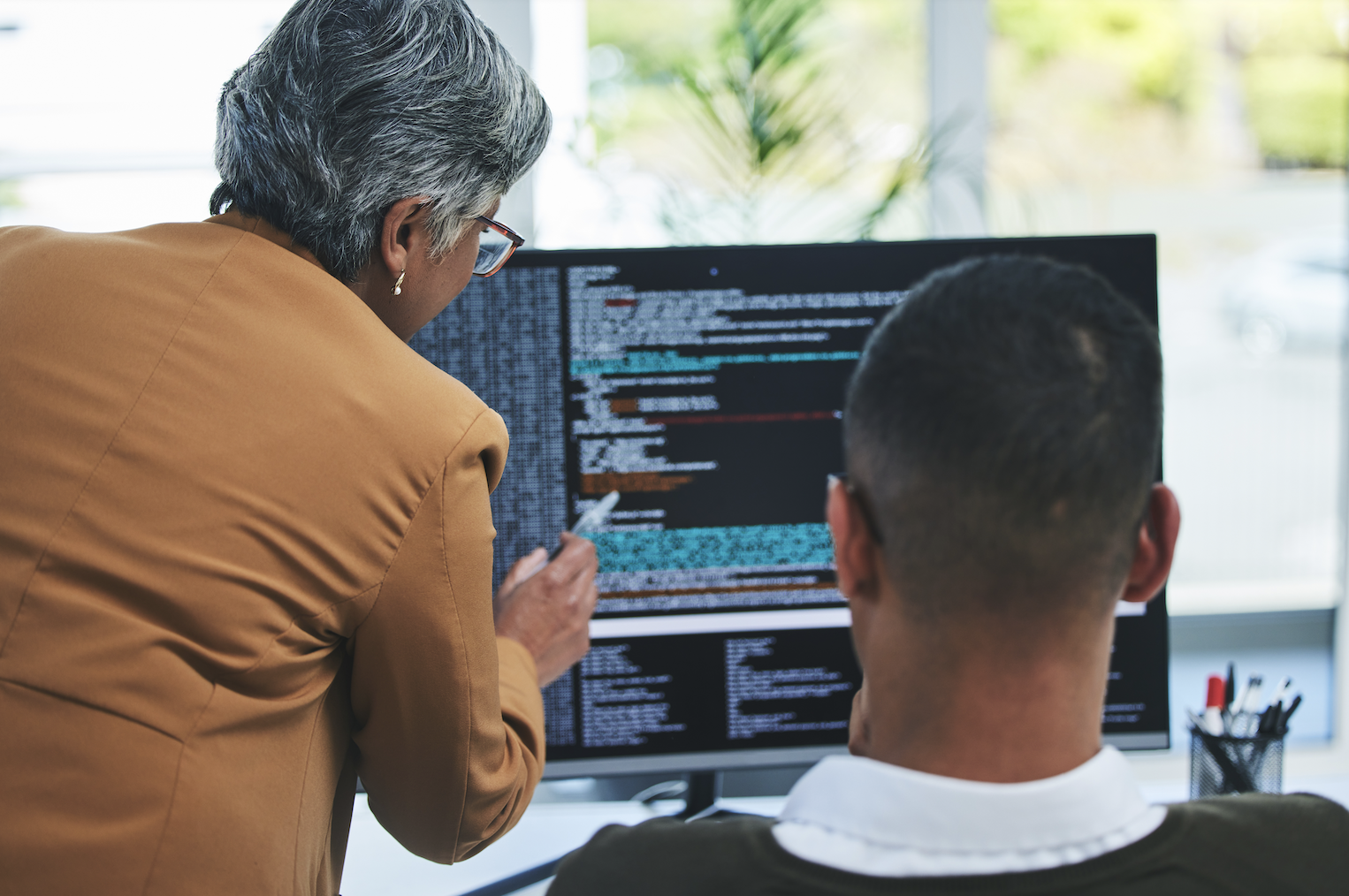 image of individuals using real estate tech