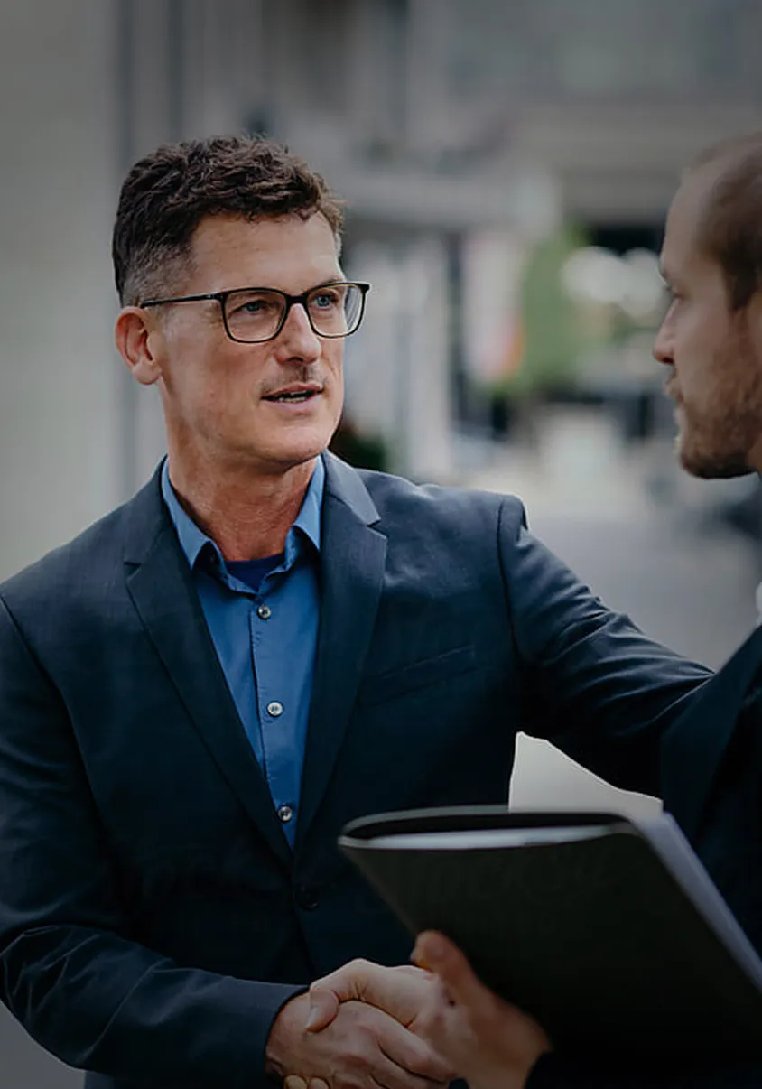 For Issuers. man shaking hands