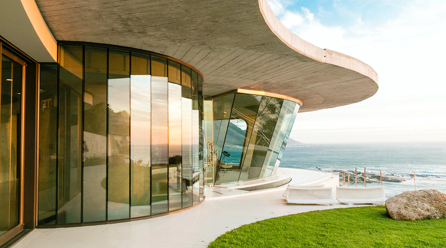 seaside luxury glass house