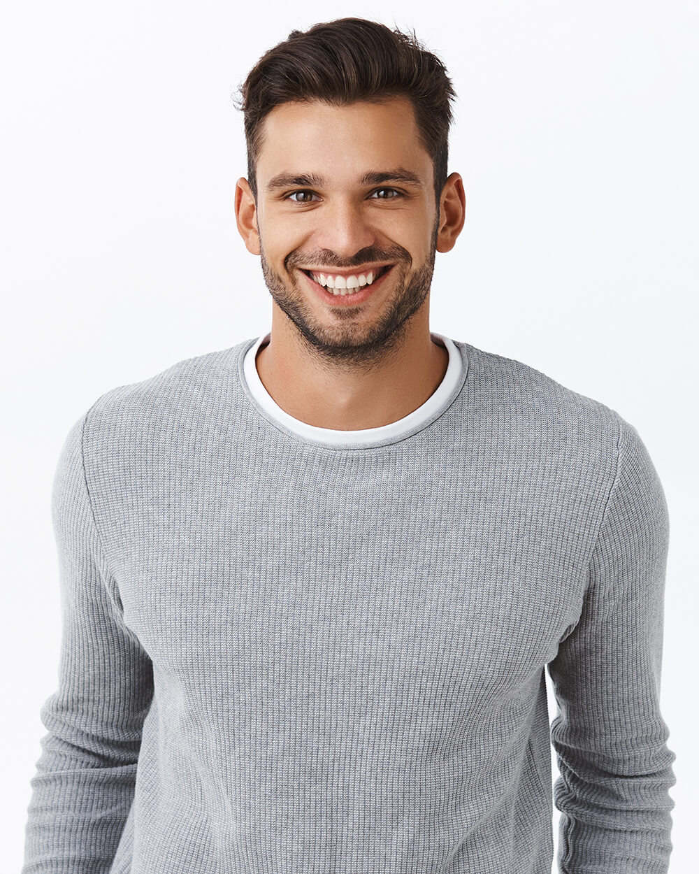 smiling man in sweater
