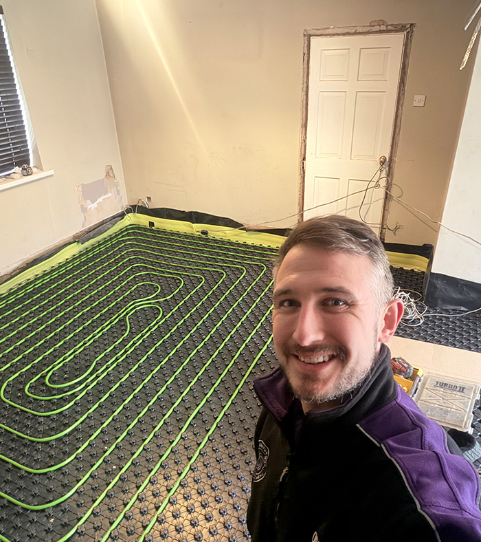 Dave posing in front of underfloor heating