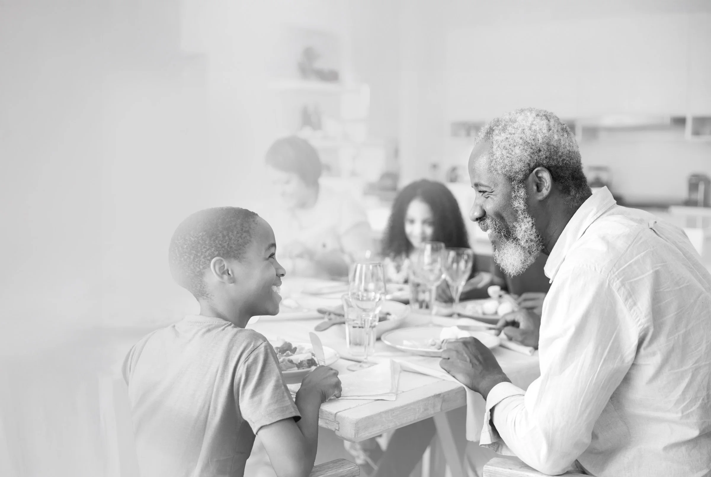 Family happily enjoying dinner