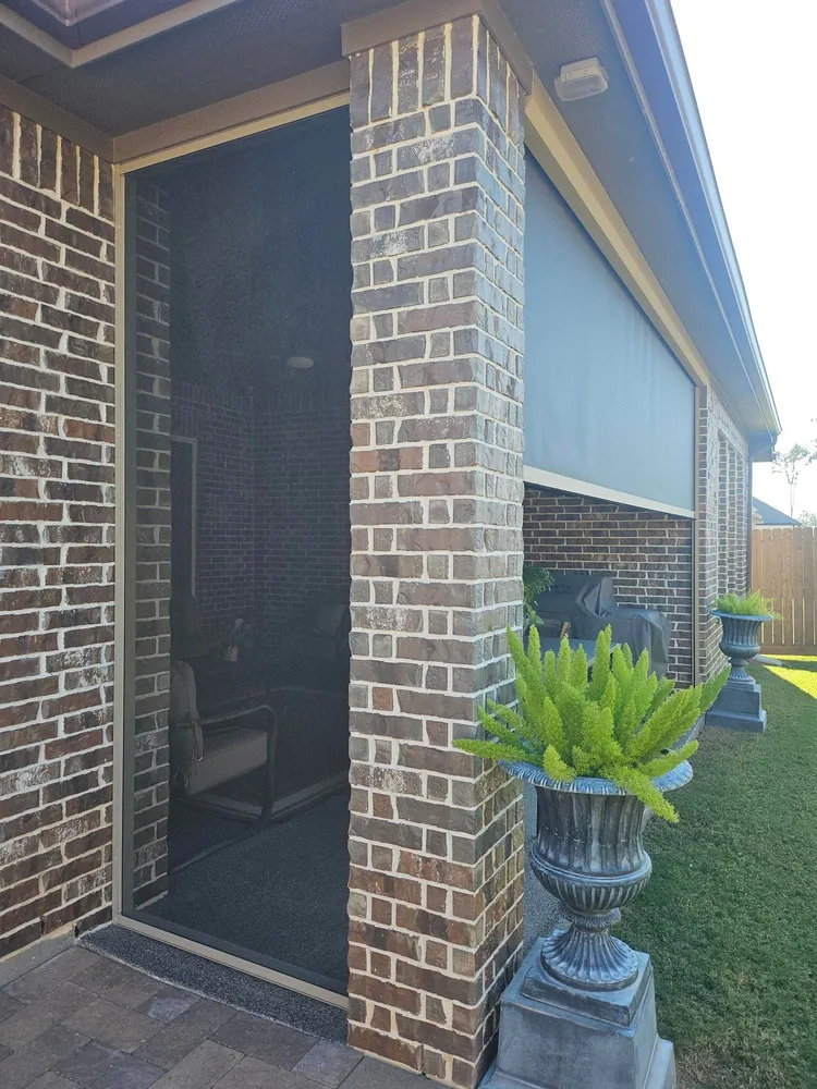 Patio with retractable screen and brick columns