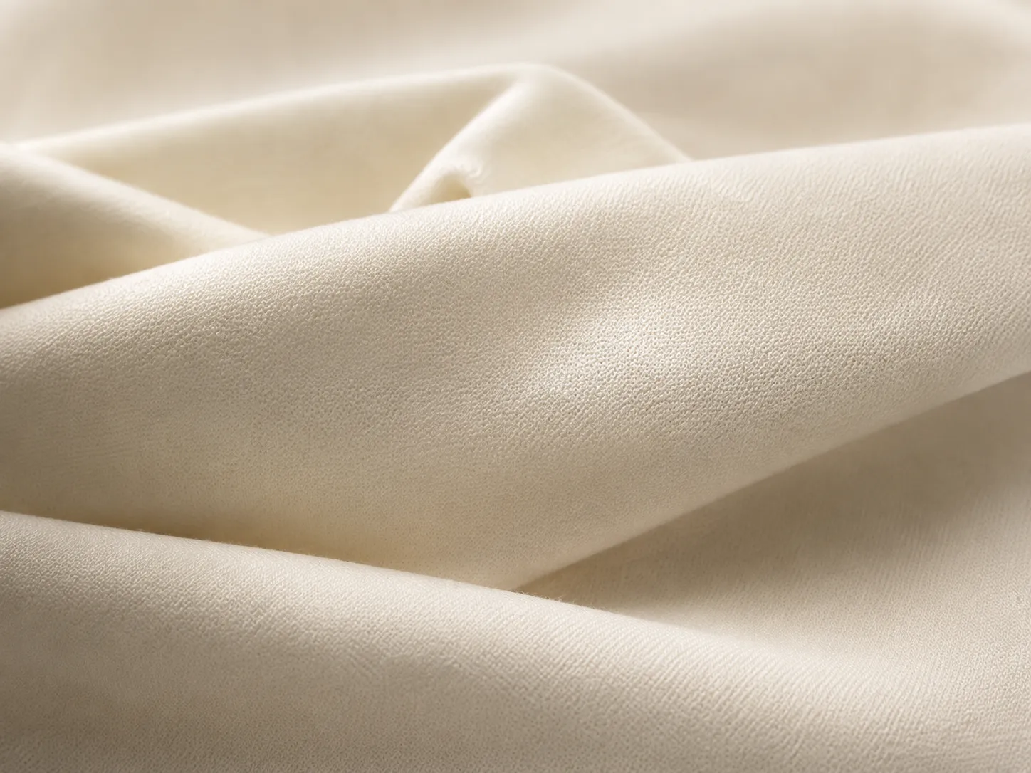 Folded ivory Ceritella Native cotton knit.