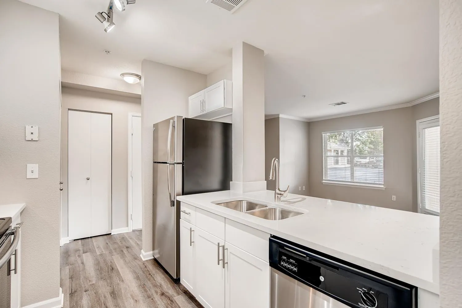 kitchen with white cabinets and stainless steel appliances