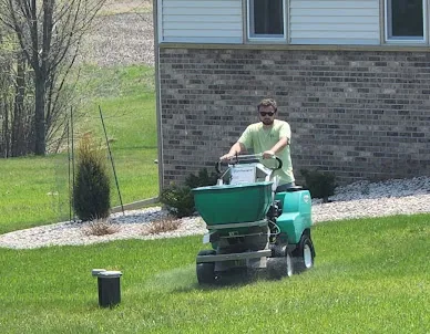 Professional providing lawn maintenance service to residents in Cedarburg, WI.