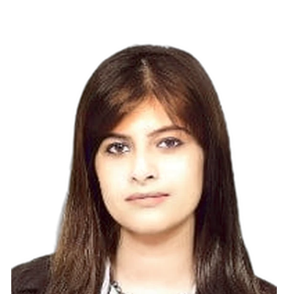 Portrait of a woman with long dark hair and a neutral expression against a white background.