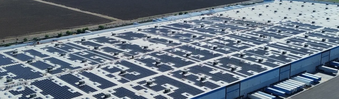 Rooftop solar installed on a warehouse, delivering distributed solar power for industrial operations.