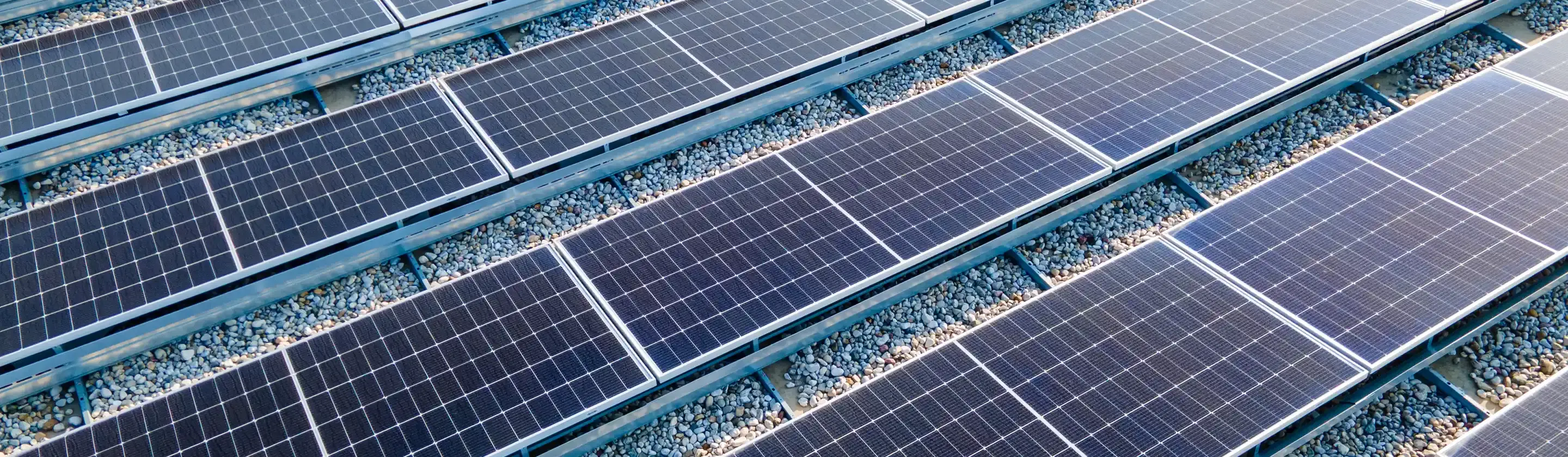 Commercial rooftop solar capturing sunlight to reduce energy costs for companies.