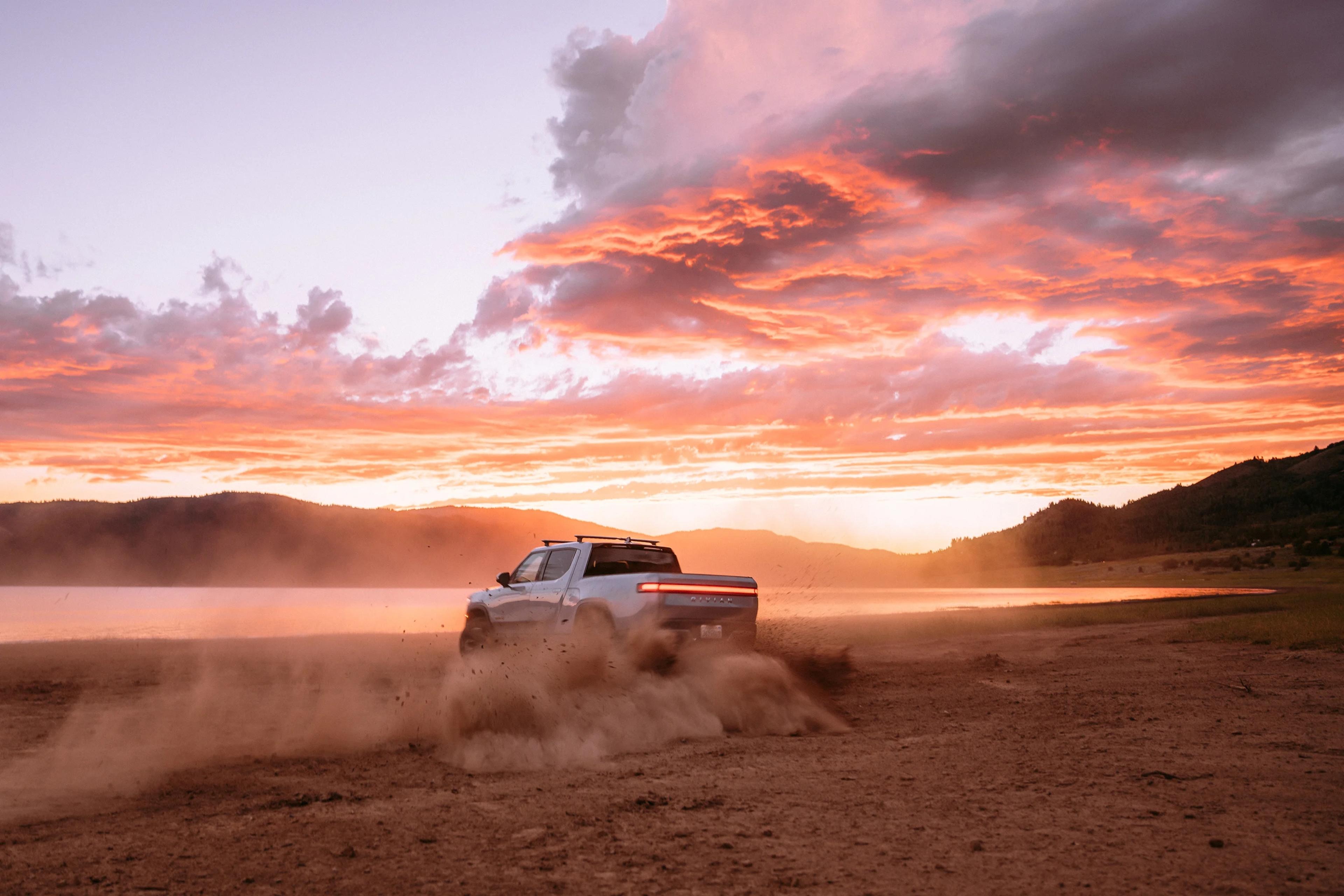 Rivian driving through the desert