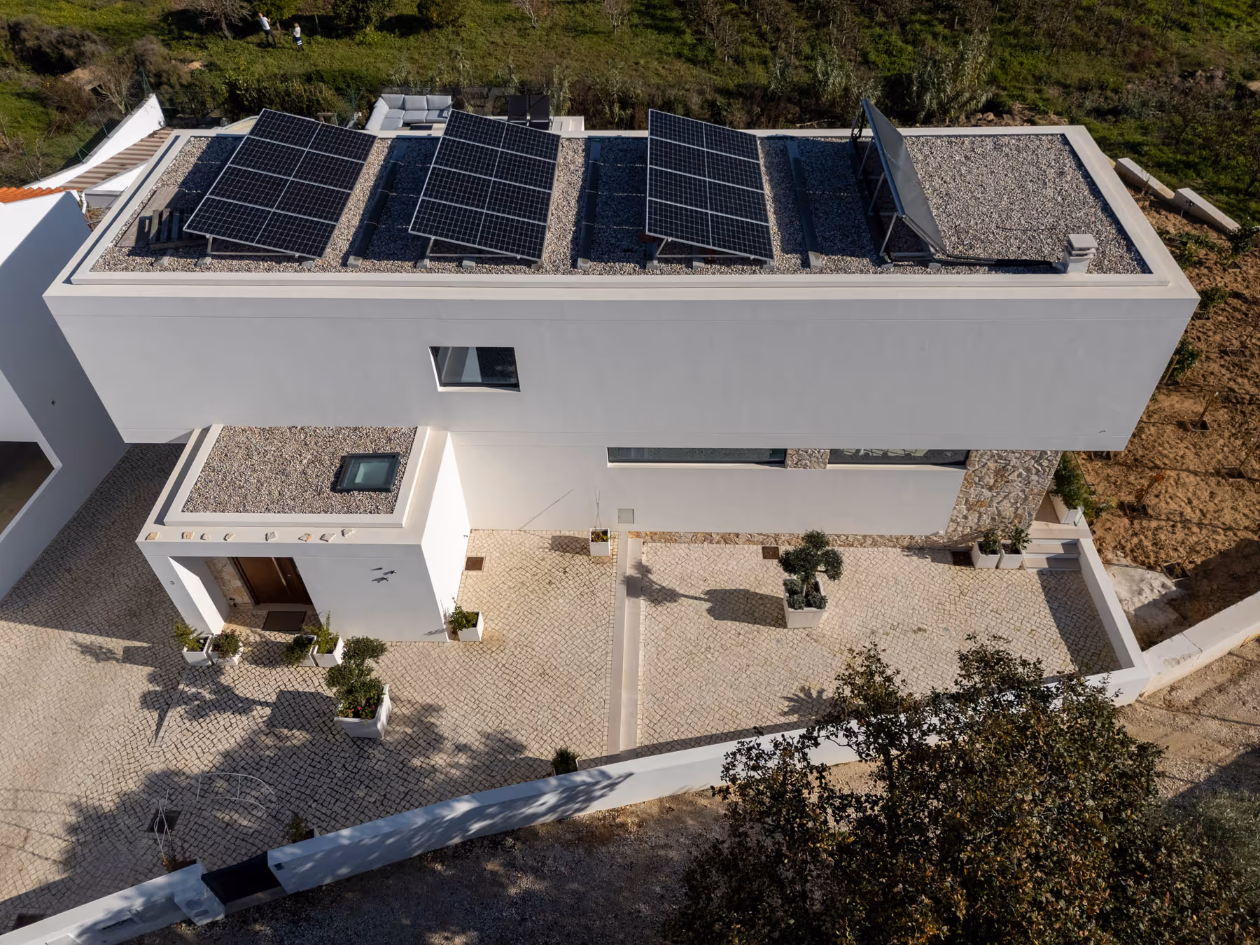 Rural Paradise Villa pool and outdoor BBQ area integrated into stone masonry terrace