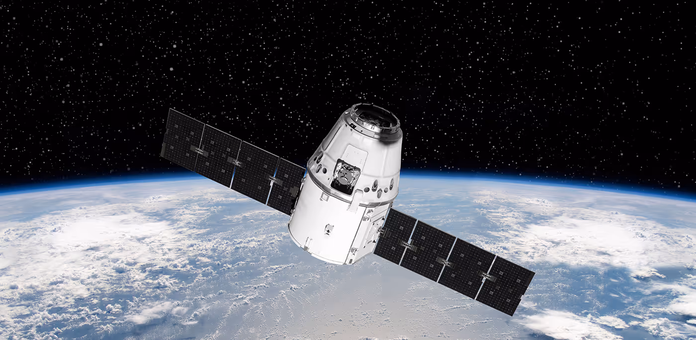 Satellite with large solar panels orbiting above Earth against a starry space background for Avicam brand