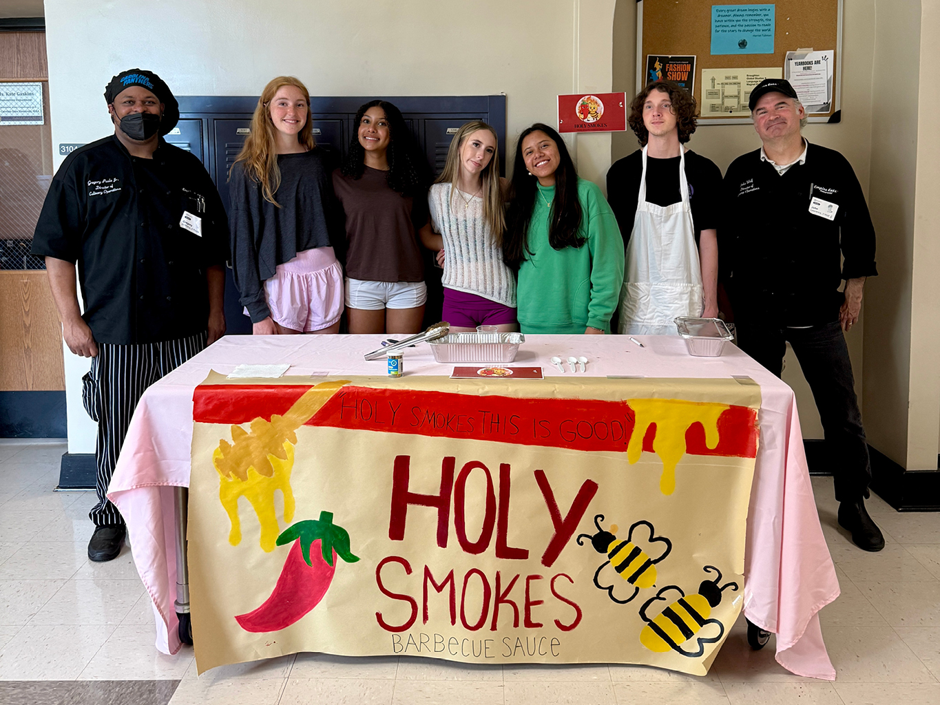 Team Holy Smokes poses with their winning sauce