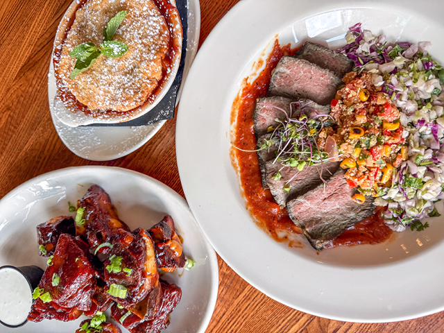 three plates of food on a table