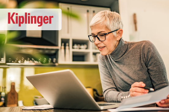 Retiree reading a Kiplinger article written by Stacia Williams from Williams Financial Group