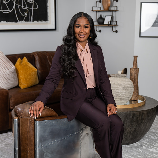 Stacia Williams from Williams Financial Group sitting in her office