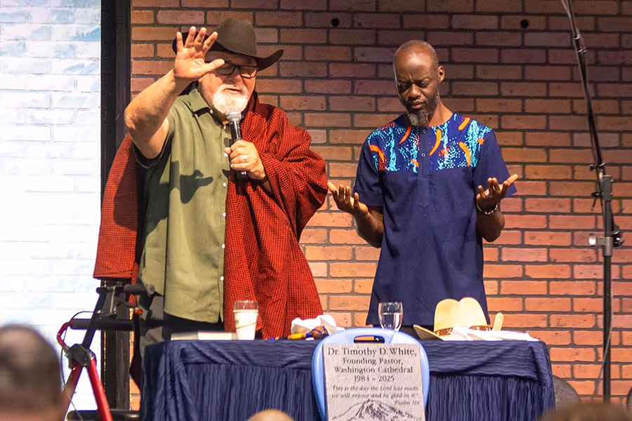 Pastor Tim and Mark on stage during Tims last service as lead pastor