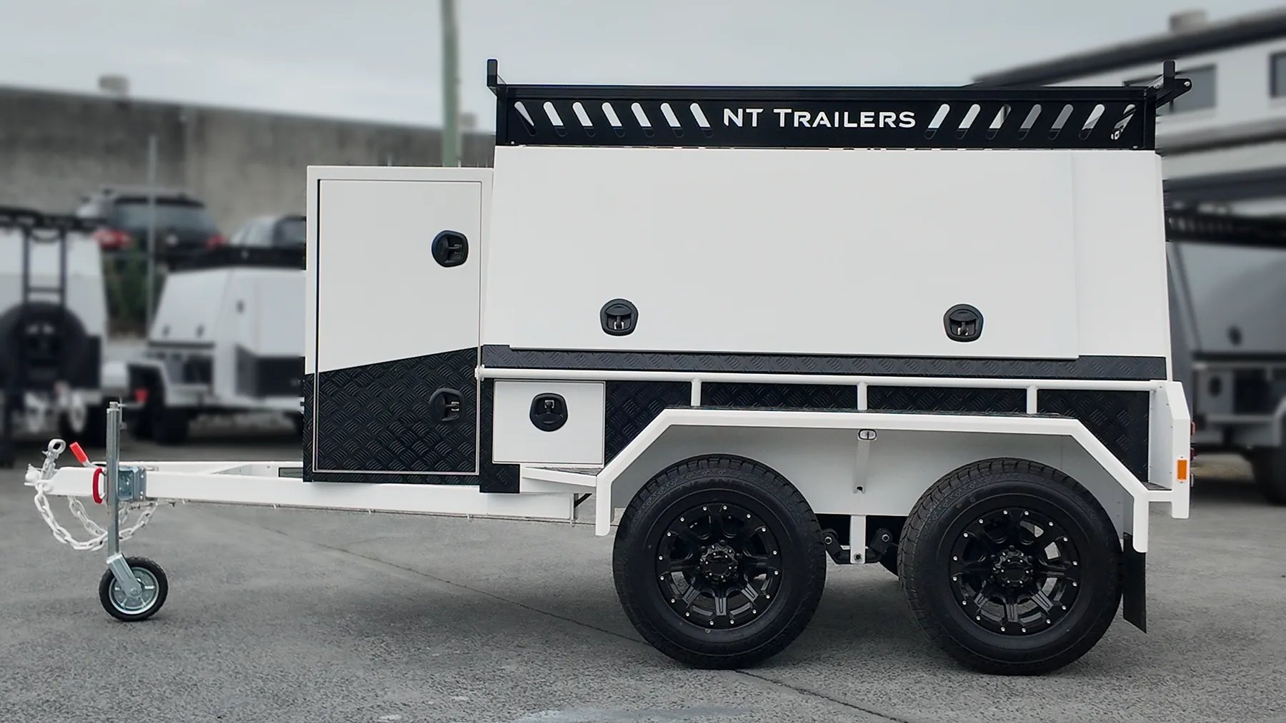 Essential Builders trailer side view in the New Tech Trailers yard, Molendinar