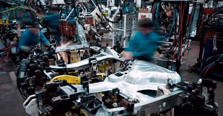 car manufacturing with humans