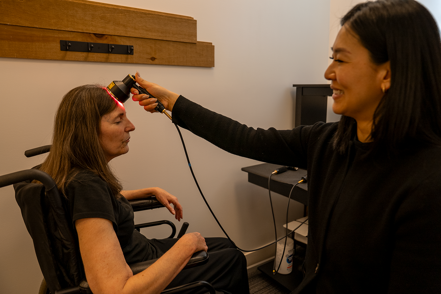 The BioSync Health Solutions teamHeather Vogl and Shirley Lo demonstrating the THOR technology.