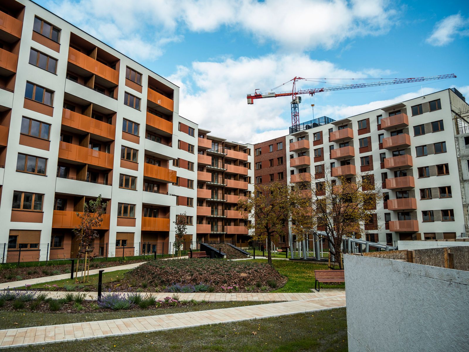 Modern residential apartment development with a construction crane